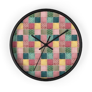 May include: A round wall clock with a black frame and a patchwork design. The clock face features a variety of colors and patterns, including red, yellow, green, and blue.