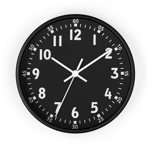 May include: A black clock with white numbers and hands. The clock face has a white outline and white markings for the minutes. The clock is set to 11:55.