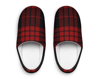 May include: A pair of red and black plaid slippers. The slippers are made of a soft, comfortable material and have a closed toe.