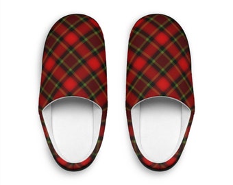 May include: A pair of red, green, and black plaid slippers. The slippers have a white interior and a black trim.
