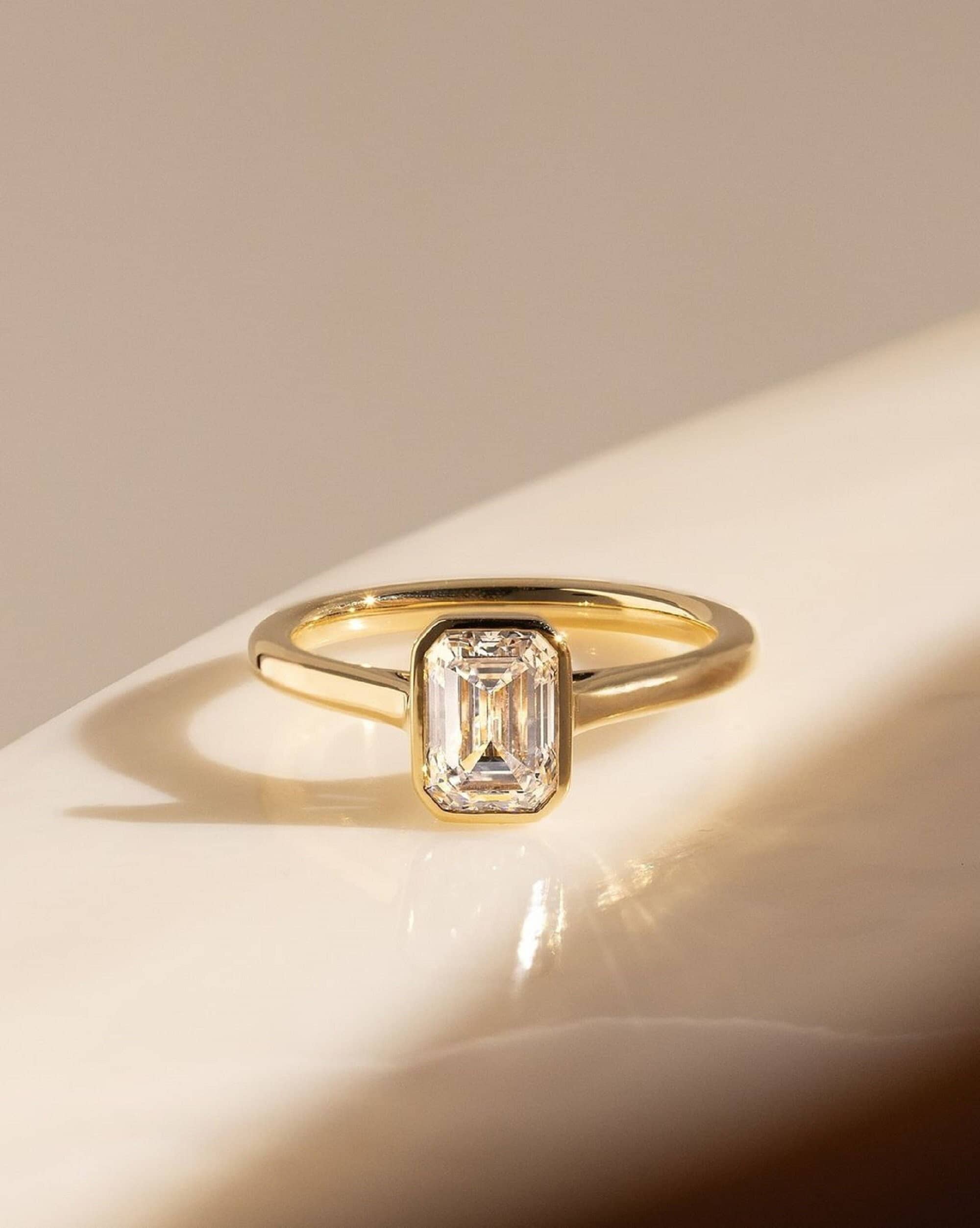 1.75 CT Emerald Cut Moissanite Ring 10k/14k Gold Bezel Set