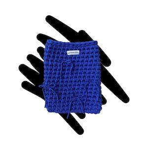 May include: A blue crocheted bag with a white label that says "LOOPYTHREADS". The bag has a drawstring closure and is made with a chunky yarn.