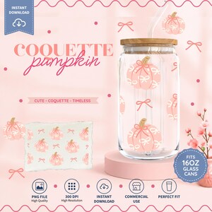May include: A clear glass tumbler with a bamboo lid and a glass straw, featuring a repeating pattern of light pink pumpkins decorated with white bows. The text reads COQUETTE pumpkin, CUTE - COQUETTE - TIMELESS, and FITS 16OZ GLASS CANS.