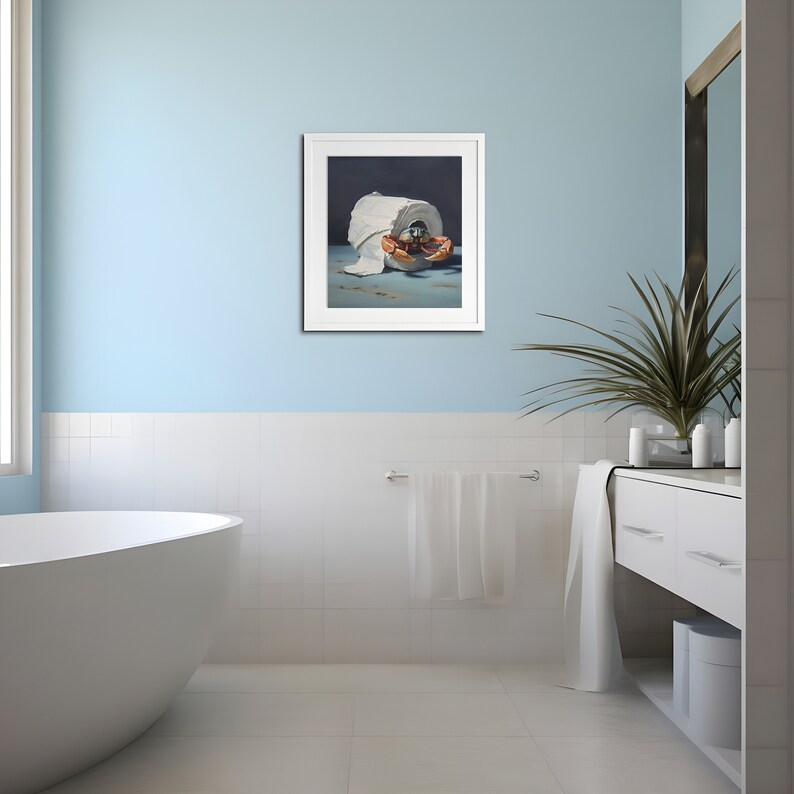 A coastal themed bathroom with a painting on the wall. The painting is of a crab crawling out of a roll of toilet paper against a dark background.