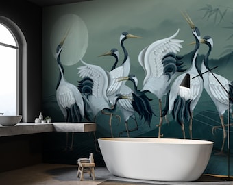 May include: A bathroom with a white bathtub and a mural featuring a flock of white cranes with black wings and long necks. The mural is set against a green and blue background with a large, white moon.