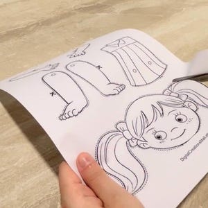 Puede incluir: Mu&ntilde;eca de papel imprimible con cabeza, cuerpo, brazos y piernas de ni&ntilde;a. La mu&ntilde;eca est&aacute; lista para ser coloreada.