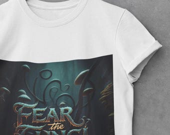 May include: White t-shirt with a graphic print of a dark forest with mushrooms and the text "FEAR the FUNGI" in a stylized font.