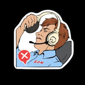May include: A sticker featuring a cartoon illustration of a person wearing a headset with a microphone. The person is shown with a frustrated expression, and a red speech bubble with a white "X" is visible. The letters "SDN" are printed on the person's shirt.