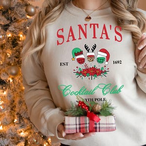 Santas Cocktail Club Christmas Sweatshirt Funny Christmas Sweater Espresso Martini Dirty Martini Christmas Crewneck Funny Christmas sweater