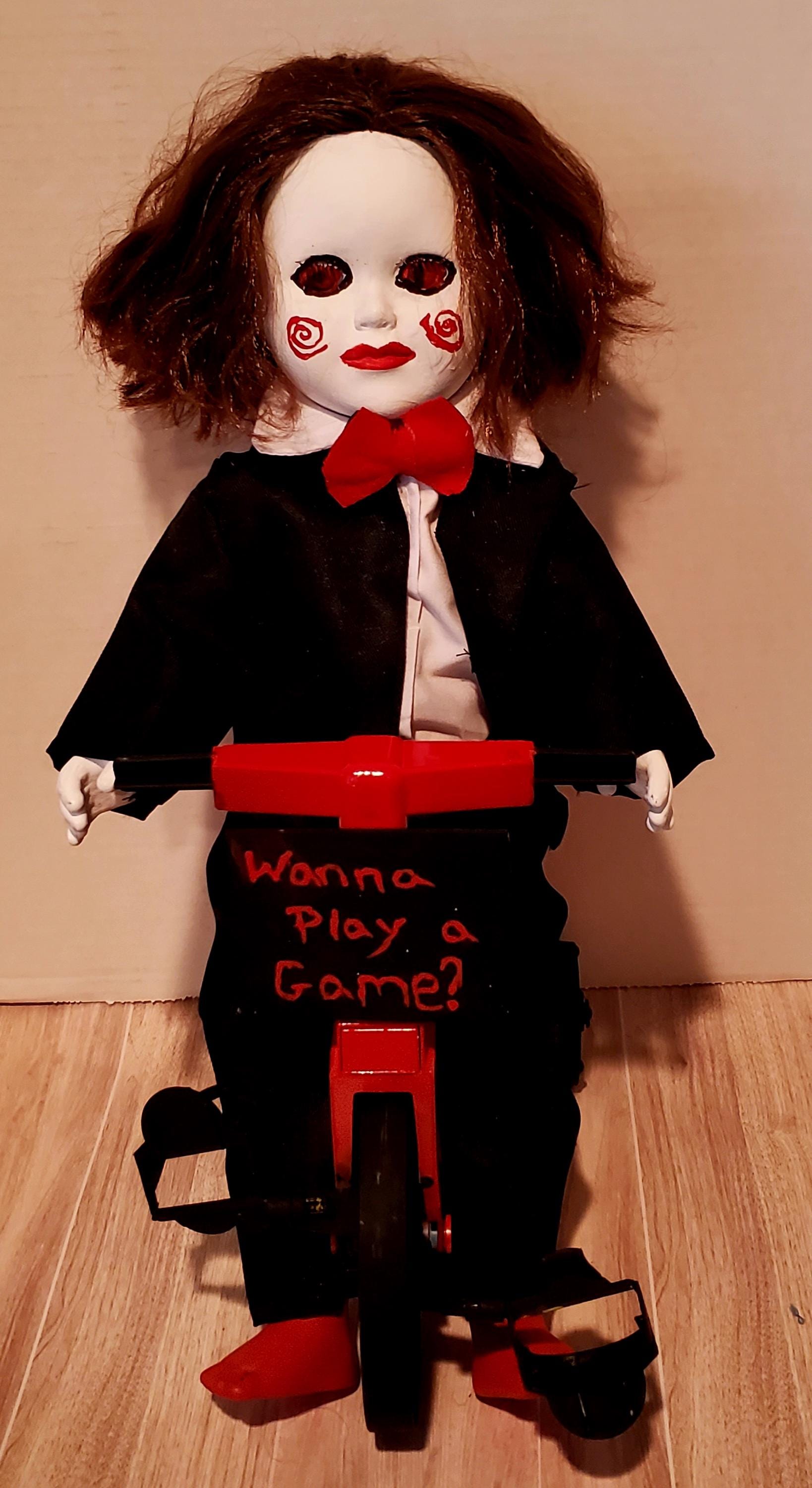 Saw Creepy Baby Doll on Tricycle