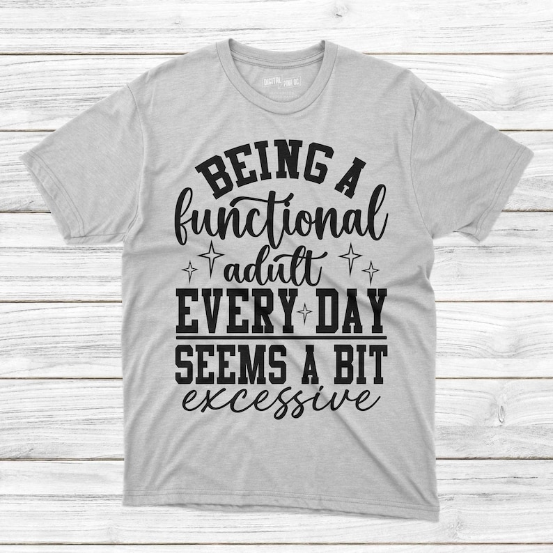 May include: Gray t-shirt with black text that reads "Being a functional adult every day seems a bit excessive".