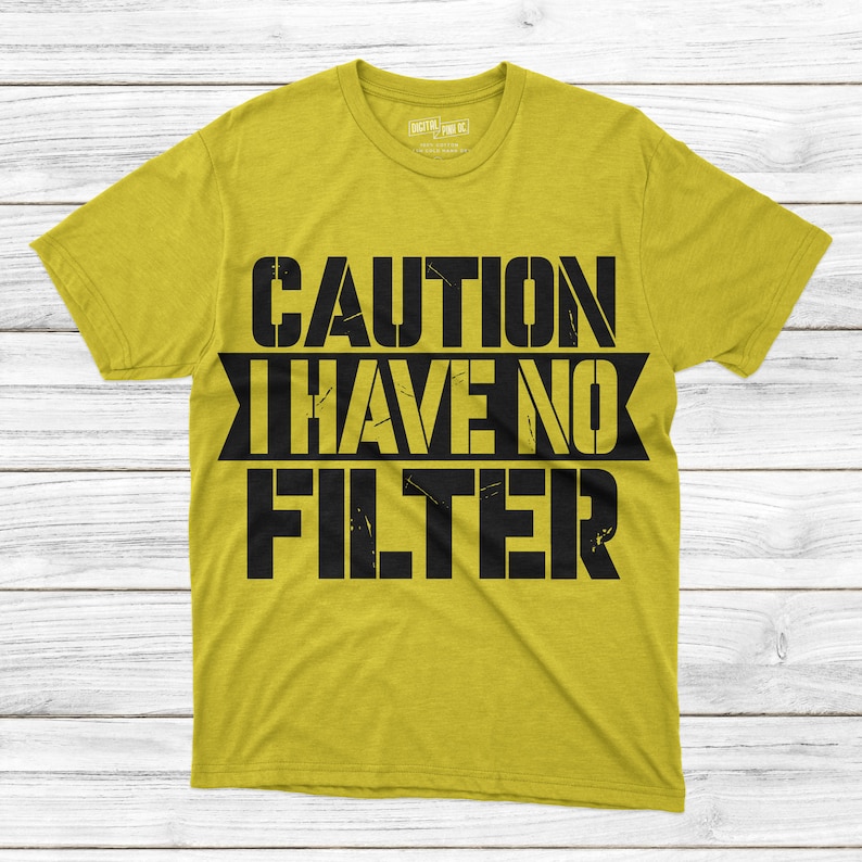 May include: A yellow t-shirt with the text "CAUTION I HAVE NO FILTER" printed in black.