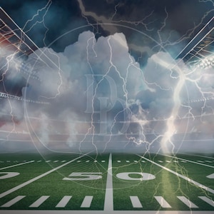 May include: A football pitch with a 50 yard line, with a stormy sky above. The sky is dark grey with white clouds and lightning bolts. A large, circular, transparent image of a dollar sign is superimposed over the sky.