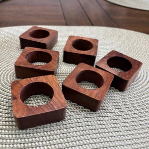 Set of six solid wood square napkin ring holders
