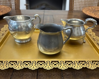 Three vintage Victorian silver pewter creamers