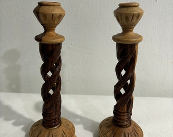 Two hand carved wood twisted tapered candle holders
