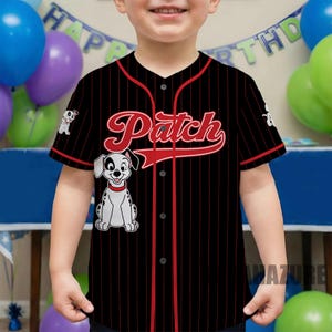 May include: Black baseball jersey with red pinstripes and trim. The jersey features the name "Patch" in red script across the chest, along with a cartoon Dalmatian dog. The jersey has a button-up front and short sleeves.