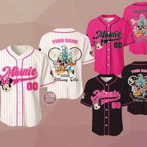 May include: Baseball jerseys with "Minnie" and "00" in pink, and a Minnie Mouse graphic. One jersey is white with pink pinstripes, another is pink with black pinstripes, and a third is black with pink pinstripes. The back of the jerseys feature a Disney graphic and the text "2026 Disney Trip".