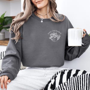 Sorry, I'm Booked Unisex Crewneck Sweatshirt Chest Design