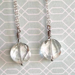 Long earrings, dangle earrings with clear, faceted, glass beads. Ear wires, long, thin chain. Sparkly, gift for her.
