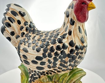 A vintage chicken rooster hen sculpture, black and white speckled kitschy decor ceramic