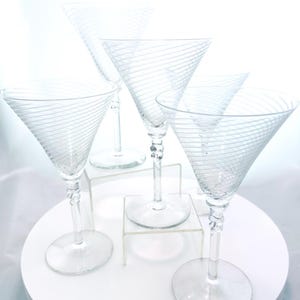 A vintage set of 5 retro twisted stem cyclone/ swirl circle etched martini barware glasses