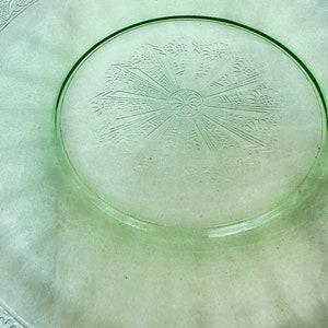 A vintage uranium glass luncheon plate, green depression era glass salad plate 8.25 inches in diameter, green glass plate