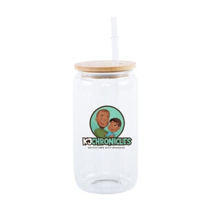 May include: A clear glass tumbler with a bamboo lid and a straw. The tumbler has a colorful graphic of a man and a child with the text "KJ Chronicles Adventures with Grandad".