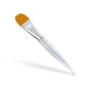 May include: A silver makeup brush with a light blue handle and a yellow bristle head. The handle has the text "Paradise Makeup A10" printed on it.