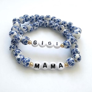 PORCELAIN beads bracelets accented with 14k gold plated beads, acrylic beads. Shown Gigi and Mama. They can be personalized. Gifts.