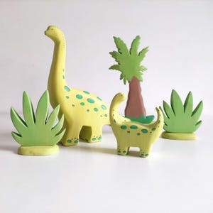 Perfect for Montessori and Waldorf-inspired play, this eco-friendly toy fosters creativity, fine motor skills, and a love for nature. Whether used as part of a tropical landscape playset or displayed as whimsical decor, the smooth, non-toxic finish.