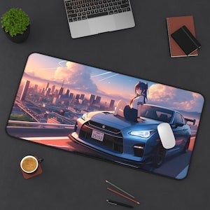 May include: A blue and white anime-style mousepad featuring a girl sitting on the hood of a blue sports car. The car has a license plate that reads "25152". The background is a cityscape at sunset.