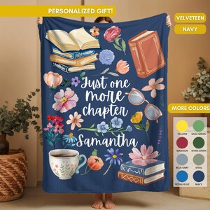 May include: Navy blue velveeteen blanket with floral and book illustrations. The blanket features the text "Just one more chapter Samantha" and "PERSONALIZED GIFT!". Additional color options are displayed.