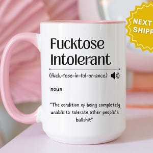 ceramic mug with red interior, bold black text that defines “Fucktose Intolerant” as someone unable to tolerate other people’s bullshit, ideal for sarcastic gift