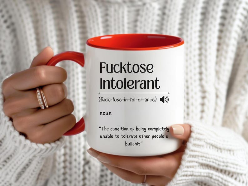 ceramic mug with red interior, bold black text that defines “Fucktose Intolerant” as someone unable to tolerate other people’s bullshit, ideal for sarcastic gift
