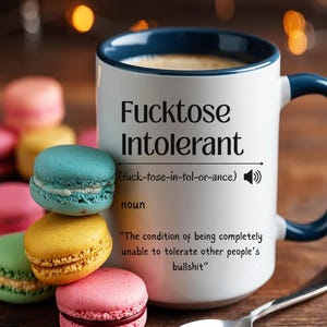 ceramic mug with red interior, bold black text that defines “Fucktose Intolerant” as someone unable to tolerate other people’s bullshit, ideal for sarcastic gift