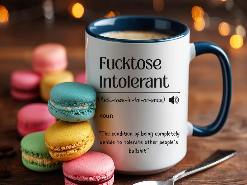 ceramic mug with red interior, bold black text that defines “Fucktose Intolerant” as someone unable to tolerate other people’s bullshit, ideal for sarcastic gift