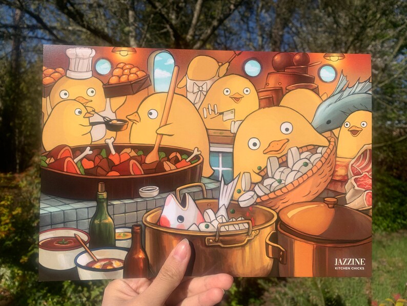 May include: A colourful illustration of a group of yellow chickens cooking in a kitchen. The chickens are wearing chef hats and aprons and are preparing a variety of dishes, including a pot of stew, a pan of fish, and a basket of clams. The illustration is titled "Jazzine Kitchen Chicks".