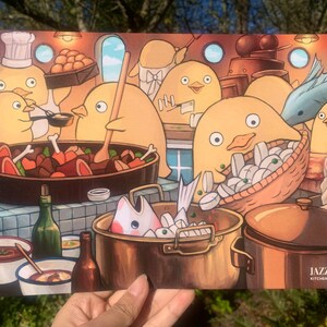 May include: A colourful illustration of a kitchen scene with cartoon chickens preparing a meal. The chickens are wearing chef hats and aprons and are cooking various dishes, including a pot of stew, a pan of fish, and a basket of vegetables. The illustration is titled "Jazzine Kitchen Chicks".