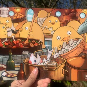 May include: A colourful illustration of a kitchen scene with yellow chicks preparing a meal. The chicks are wearing chef hats and aprons and are cooking in pots and pans. The illustration is titled "Jazzine Kitchen Chicks".