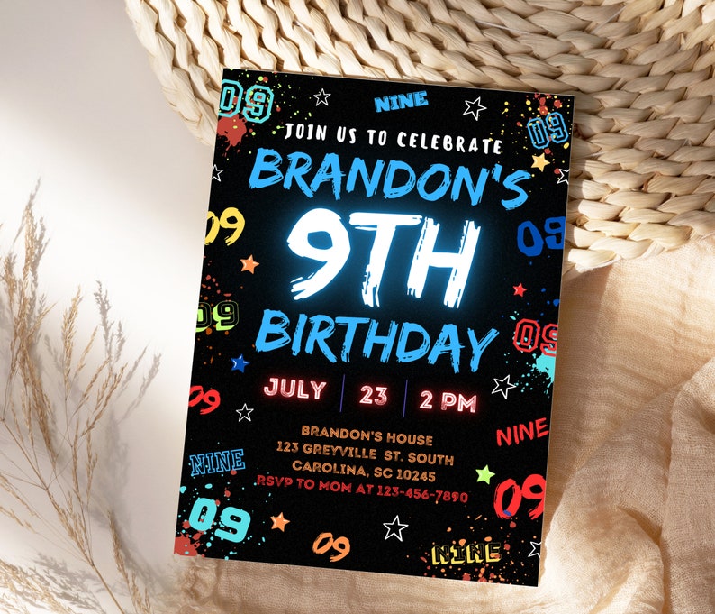 May include: A black and white birthday invitation with neon blue and red accents. The invitation says "Join us to celebrate Brandon's 9th Birthday" with the date and time of the party. The invitation is decorated with stars and the number "09" in various colors.
