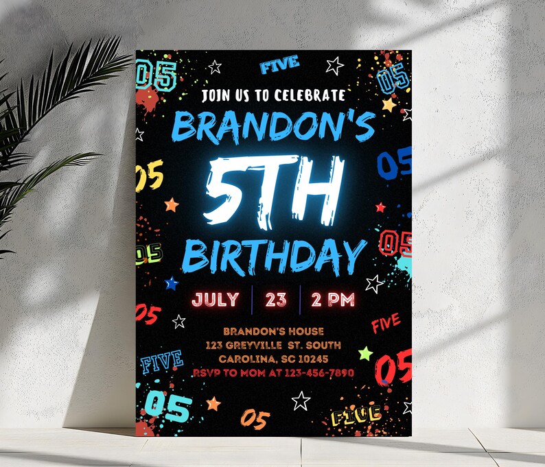 May include: A black and neon-colored birthday party invitation for a 5th birthday. The invitation features the text "Join us to celebrate Brandon's 5th Birthday" with a blue and white neon-style 5. The invitation also includes the date and time of the party, "July 23, 2 PM", and the location, "Brandon's House, 123 Greyville St. South, Carolina, SC 10245".