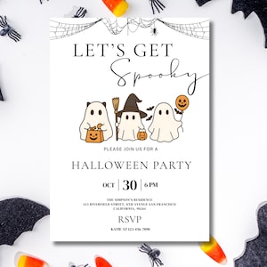 May include: A white Halloween party invitation with the words "LET'S GET Spooky" in black script. The invitation features three cartoon ghosts, a spider web, and the date October 30th at 6 PM. RSVP details are included.