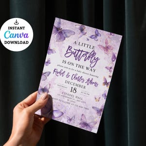 May include: A baby shower invitation with a purple butterfly theme. The invitation reads "A Little Butterfly Is On The Way" with details for Rachel & Charles Adams' baby shower on December 18th. The design includes butterfly illustrations and the words "Instant Canva Download."