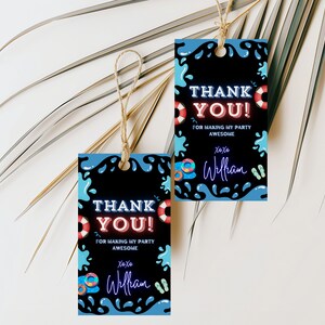 May include: Two blue and black thank you tags with neon text that says "Thank You!" and "For making my party awesome." The tags have a blue and black water splash design with a life preserver, flip flops, and a donut.