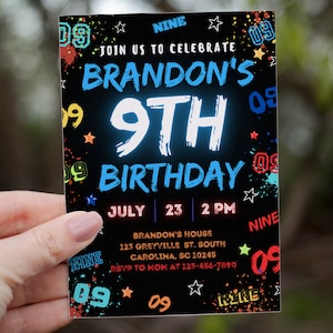 May include: A black birthday invitation with colorful paint splatters and stars. The text reads "Join us to celebrate Brandon's 9th Birthday" with the number 9 in neon blue. The date and time are July 23, 2 PM. The invitation also includes the address and RSVP information.