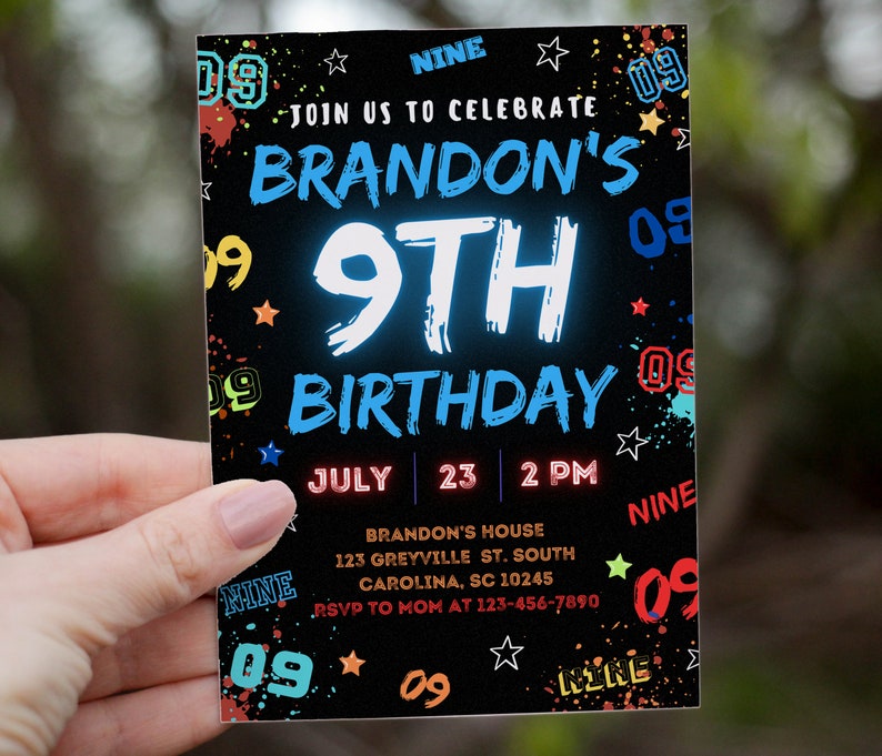 May include: A black birthday invitation with colorful paint splatters and stars. The text reads "Join us to celebrate Brandon's 9th Birthday" with the number 9 in neon blue. The date and time are July 23, 2 PM. The invitation also includes the address and RSVP information.