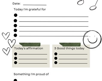 Op de afbeelding: Een zwart-wit printbaar dankbaarheidsdagboek met een hart-, noot- en smiley-ontwerp. Het dagboek bevat secties voor het opsommen van dingen waar je dankbaar voor bent, affirmaties, goede dingen die vandaag zijn gebeurd en dingen waar je trots op bent.