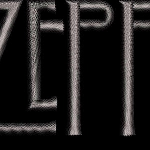 May include: The Led Zeppelin logo, in a textured, silver-gray font, is displayed against a black background. The band's name is written in a stylized, Art Nouveau-inspired typeface, with each letter distinct.