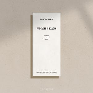 Peut inclure: Une carte d'annonce de mariage simple avec le texte "Bienvenue au mariage de Primrose & Keagan" et la date "20 octobre 2024" et le lieu "Lake Oswego, Oregon".